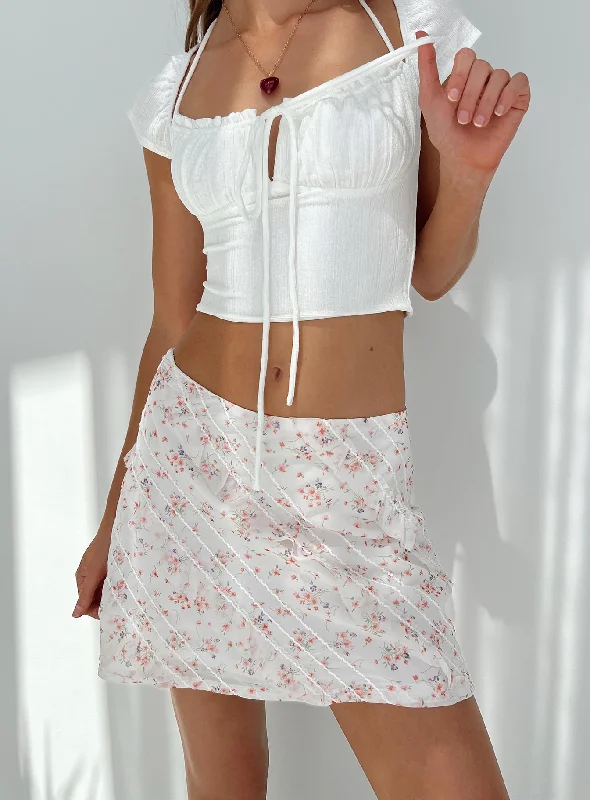 Hasmyn Mini Skirt White / Floral tiered skirt playful
